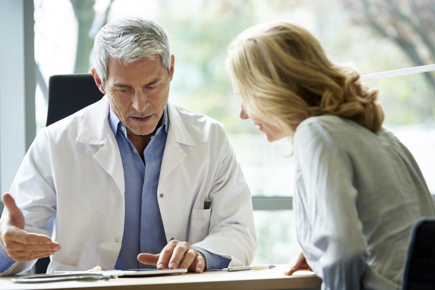 Doctor speaking with a patient